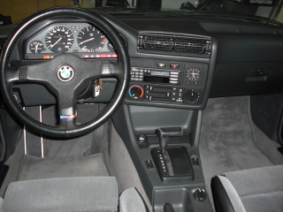 Illustration for article titled A super clean E30 325i with an automatic, worth the trouble?